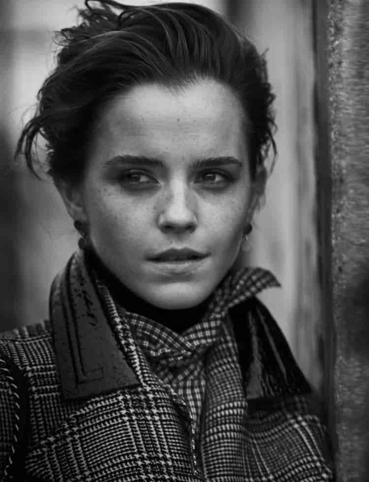 Covering up, Emma Watson poses in Carven coat and Simone Kirkland scarf