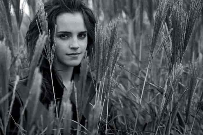 Posing outdoors, Emma Watson wears Kwaidan Editions coat