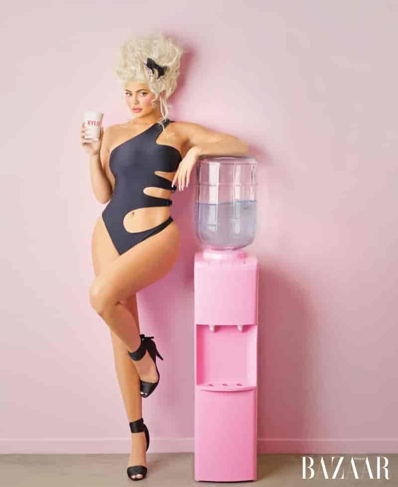 Social media star Kylie Jenner poses in Tom Ford swimsuit and sandals