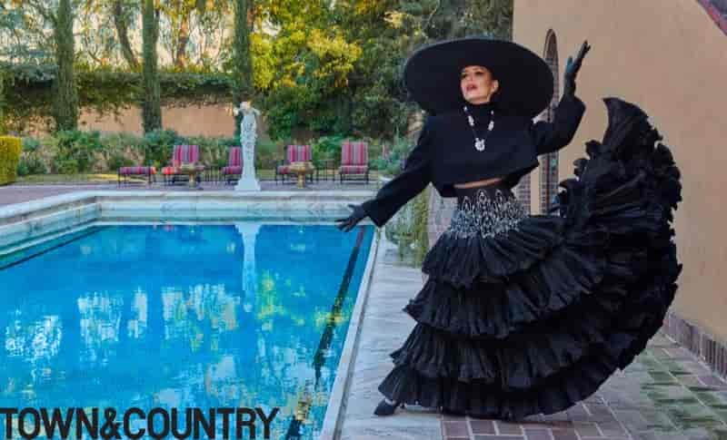 Eva Longoria strikes a pose in an all-black ensemble.