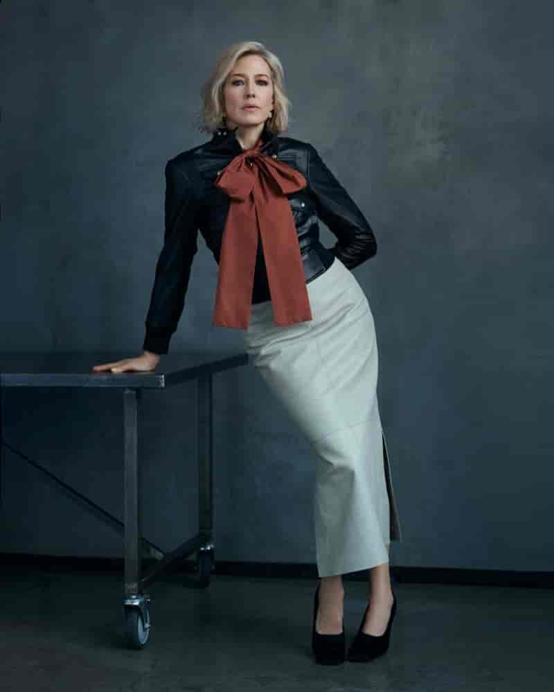 Actress Carrie Coons strikes a pose in a leather blouse and pencil skirt.