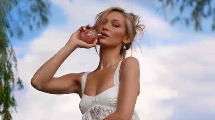 Bella Hadid Floats in Orebella Eternal Roots Fragrance Ad