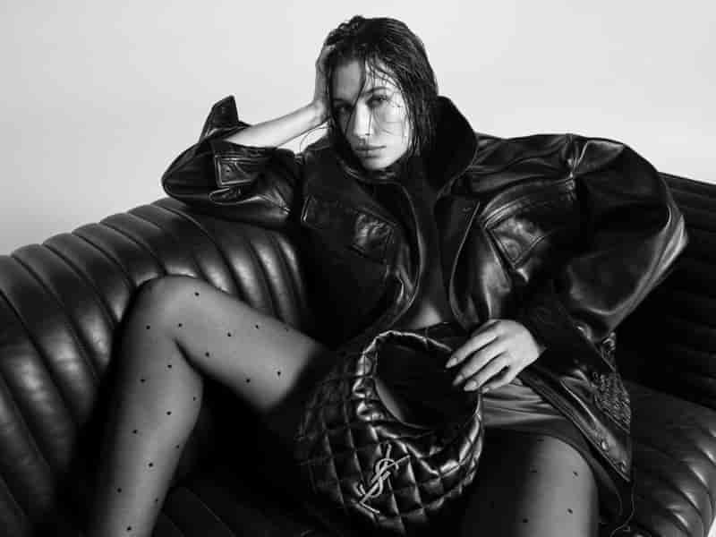 Hailey Bieber poses in Saint Laurent's fall 2025 campaign.