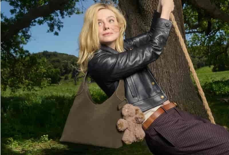 Elle Fanning fronts Coach's fall 2025 campaign.