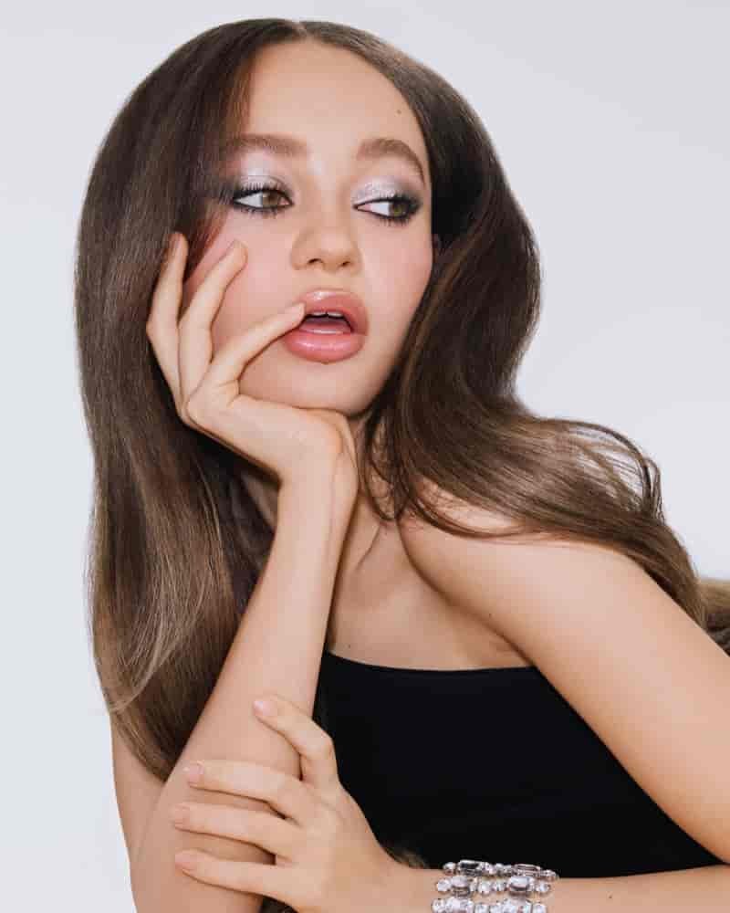 Nico Parker poses in Lancôme's 90th anniversary campaign.
