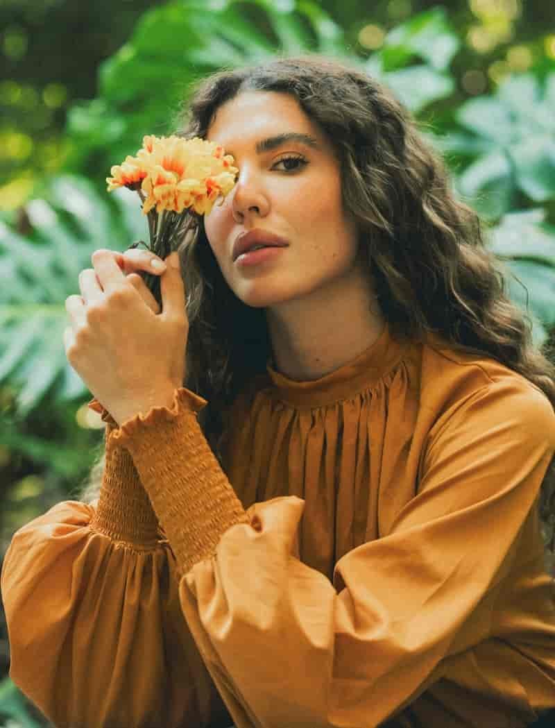 Woman orange flower