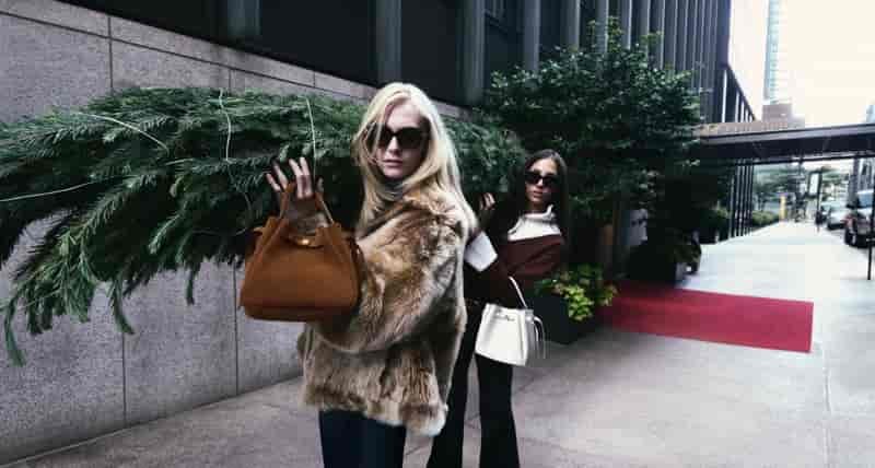 Alex Consani and Yasmin Wijnaldum pose for Tory Burch's Holiday 2025 campaign.