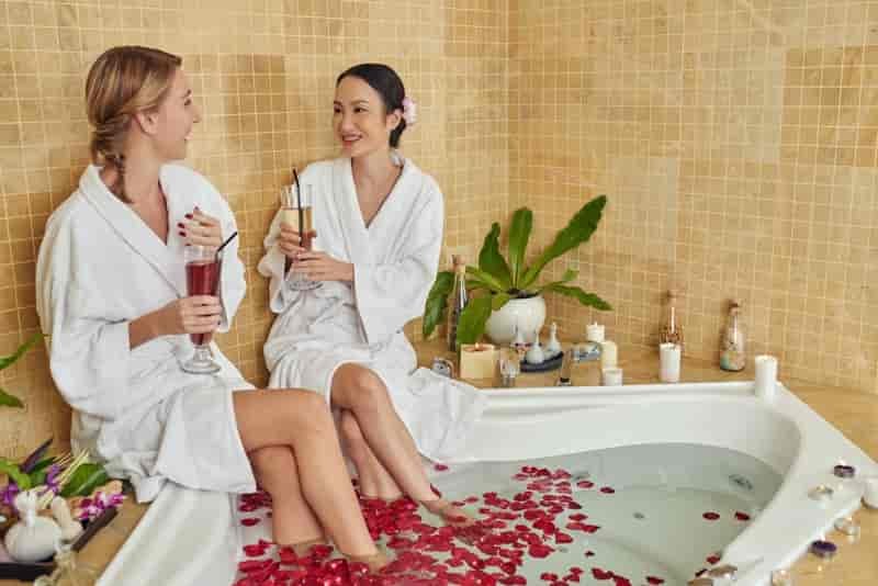 Two woman spa bath